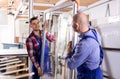 Two workers inspecting windows Royalty Free Stock Photo