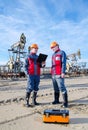 Two workers in the oilfield Royalty Free Stock Photo