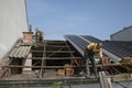 Two workers roofer builder working on roof structure on construction site Royalty Free Stock Photo