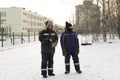 Two workers at the site of the ice camp