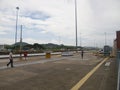 Two workers walk through the Miraflores canal, Panama.