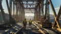 Two Workers Walking on Railroad Tracks Under a Rusty Bridge Royalty Free Stock Photo
