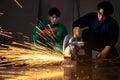 Two workers are welding steel in industrial plants Royalty Free Stock Photo