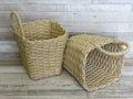 Two woven baskets made of straw, rattan, cane. Beautiful Handmade Woven Bamboo / Cane Basket. Royalty Free Stock Photo