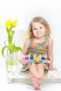 Two years old girl holding Easter eggs carton Royalty Free Stock Photo