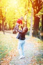 Two years old toddler have fun outdoor in autumn park Royalty Free Stock Photo