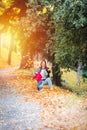 Two years old toddler have fun outdoor in autumn park Royalty Free Stock Photo