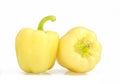 Two yellow bell peppers isolated on white background. Shiny paprika Royalty Free Stock Photo