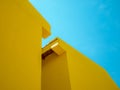 Two yellow building with clear blue sky for abstract background Royalty Free Stock Photo