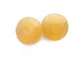 Two yellow cough drops on white background, top view Royalty Free Stock Photo