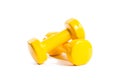 Two yellow dumbbells Royalty Free Stock Photo