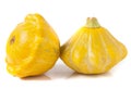 Two yellow pattypan squash isolated on white background Royalty Free Stock Photo