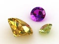 Two yellow sapphire and an amethyst stones