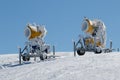 Two yellow snow guns Royalty Free Stock Photo