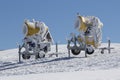 Two yellow snow guns Royalty Free Stock Photo