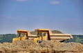 Two yellow truck with gravel Royalty Free Stock Photo