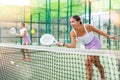 Two women tennis players playing padel Royalty Free Stock Photo
