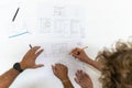 Two young architects working in their studio on a project Royalty Free Stock Photo