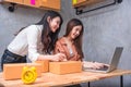 Two young Asian people startup small business entrepreneur SME d