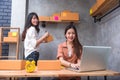 Two young Asian people startup small business entrepreneur SME d Royalty Free Stock Photo