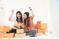 Two young Asian woman startup small business entrepreneur SME di