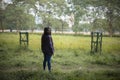 Two young Indian sisters walking in a field in winter afternoon. Royalty Free Stock Photo