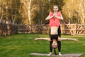 Two young attractive girls practicing yoga outdoor. Royalty Free Stock Photo