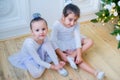 Two young ballet dancers preparing for lesson