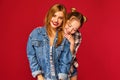 Two young beautiful blond smiling hipster girls Royalty Free Stock Photo