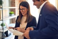 Two young beautiful business workers smiling happy and confident Royalty Free Stock Photo