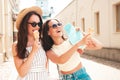 Two beautiful women outdoors Royalty Free Stock Photo