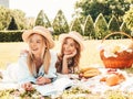 Portrait of young and beautiful women posing outdoors Royalty Free Stock Photo