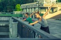 Two young beautiful twin sister dancing ballet in the city Royalty Free Stock Photo