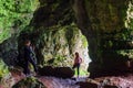 Two young beautiful women explore stunning Keash cave