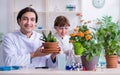 Two young botanist working in the lab