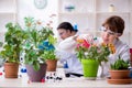 Two young botanist working in the lab