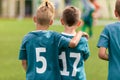 Two young boys as a teammates in sports team. Friendship in junior sport Royalty Free Stock Photo