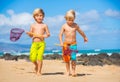 Two young boys having fun on tropcial beach Royalty Free Stock Photo