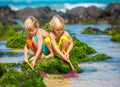 Two young boys having fun on tropcial beach Royalty Free Stock Photo