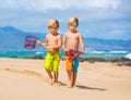 Two young boys having fun on tropcial beach Royalty Free Stock Photo