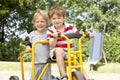 Two Young Boys Playing on Bike Royalty Free Stock Photo