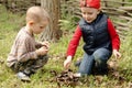 Two young boys playing with matches Royalty Free Stock Photo