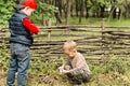 Two young boys playing with matches Royalty Free Stock Photo