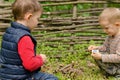 Two young boys playing with matches Royalty Free Stock Photo