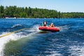 Two young boys tubing Royalty Free Stock Photo