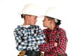 Two young brothers sneering at each other wearing Royalty Free Stock Photo