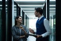 Two young business in the corridor of the conference room Rehearse information to present results and new projects to the