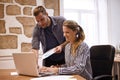 Two young business professionals in meeting Royalty Free Stock Photo