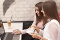 Two young business woman in a meeting at coffee break Royalty Free Stock Photo