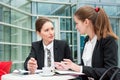 Two young business women Royalty Free Stock Photo